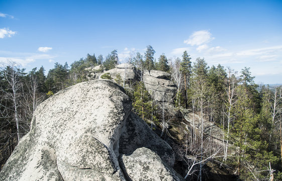 Elevated view of rock formation and forest