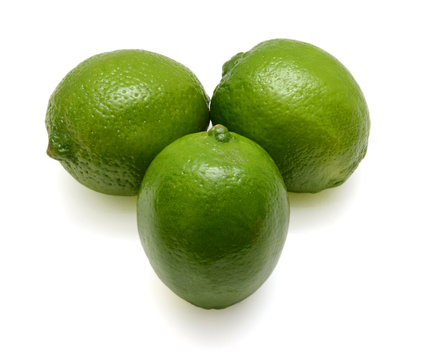 Limes isolated on white background