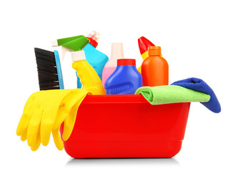 Cleaning set with tools and products in plastic tub, isolated on white