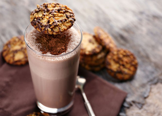 Delicious milk cocktail with cookies, close up