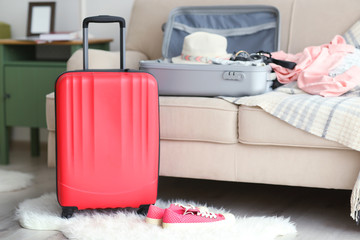 Large red polycarbonate suitcase, close up