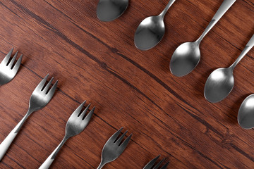 Cutlery set on wooden table