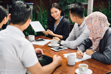 creative business meeting in a cafe