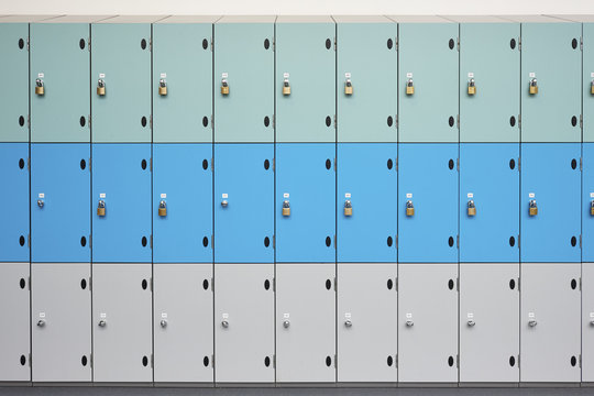 Rows of school lockers with doors closed