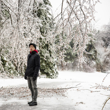 Portrait of young man standing in park at -30 degrees celcius