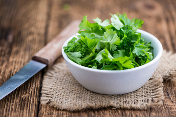 Parsley (on wooden background)