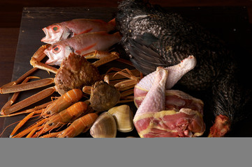 Still life with selection of seafood and chicken