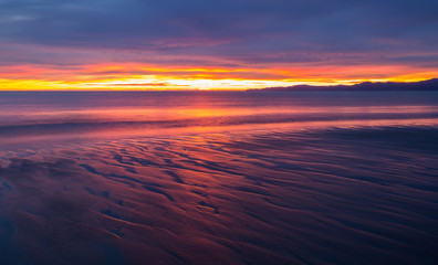 Fototapeta na wymiar sunrise at Golden Bay