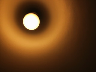 Light bulb illuminated and taken from above