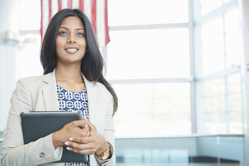 Businesswoman holding digital tablet