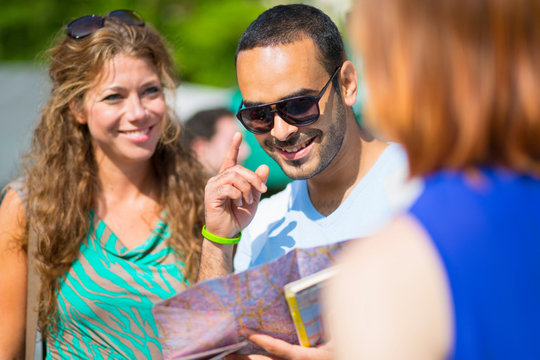 Tourists looking at map