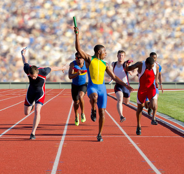 Six athletes running relay race