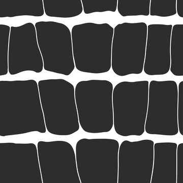 Reptile skin seamless pattern black spots on a white background.