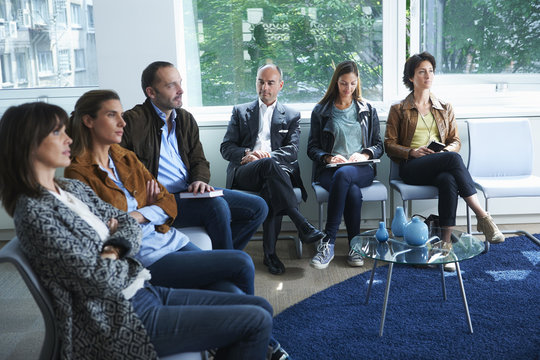 People sitting in waiting room