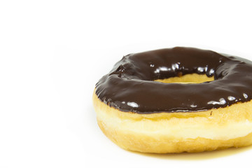 Donut glazed chocolate on white background with copyspace.
