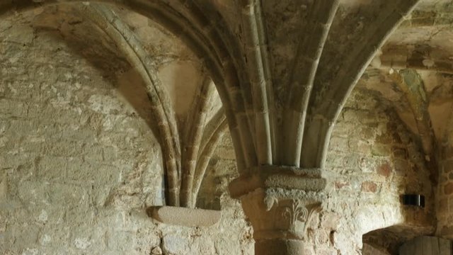 Interios of  Mont Saint Michel island   located in Normandy France 4K 3840X2160 UHD video - Mt Saint Michel famous UNESCO heritage   interior columns and ceiling arcs 4K 2160p UHD footage