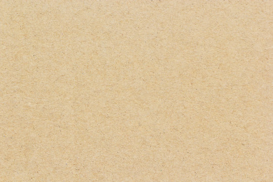 Brown cardboard background or texture