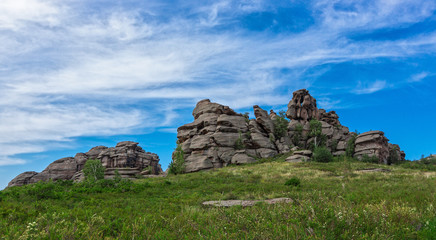 Fototapeta na wymiar Eroded granite rocks. Altai, Russia. Weathered granite rocks of the ancient massif create an amazing and unique landscape. 