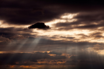 Sunbeams coming through clouds