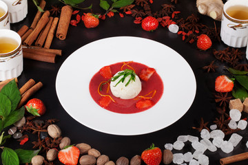 Strawberry soup with ice cream, cinnamon, tea, still life, table