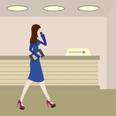 vector image of a business female walking in office premises.