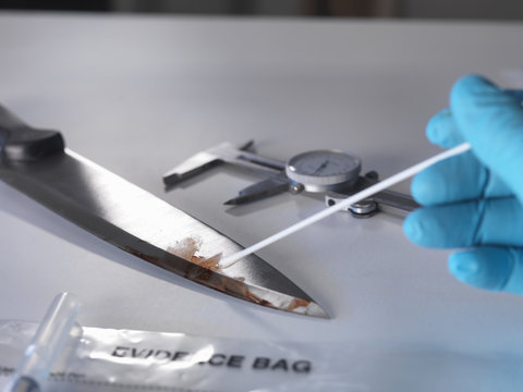 Forensic investigation of knife from crime scene