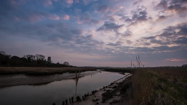 Sunset Time Lapse Clouds River Reflections - 4K Dolly Shot