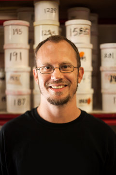 Portrait of small business manager in warehouse