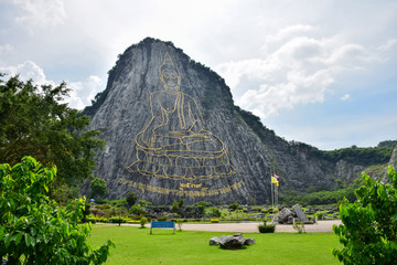 Golden Buddha laser carved on Khao Chee Chan, Sattahip, Chonburi