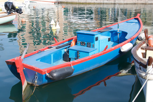 Small woody colored boats