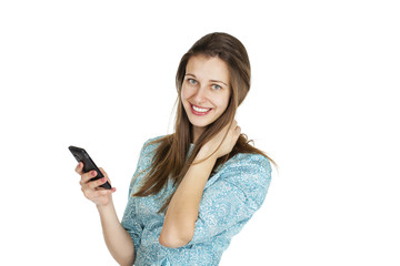 Fototapeta premium Beautiful woman writes a message on the phone