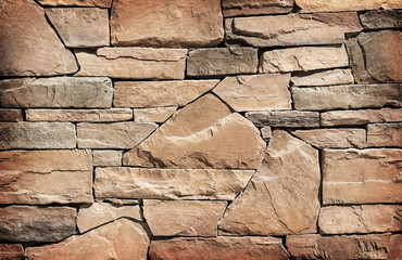 Stone wall texture or background. Brown color