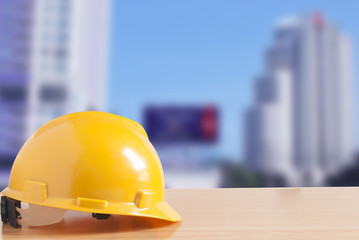 Safety helmet with construction site background