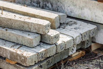 gray concrete pillars blocks on building materials warehouse .