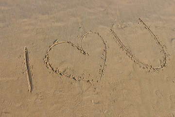 I love you beach writing. I love U written on the beach for your love.