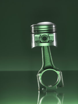 Car piston on green background
