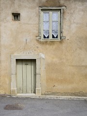 beautiful facade of a house with wall sundial , Languedoc, France