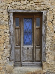 Old swing entry door with fixed leaf, Languedoc, France