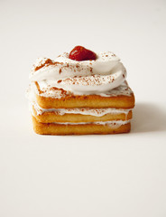 a delicious cake with a cherry