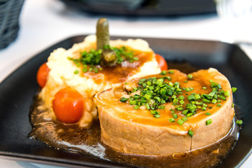 juicy steak veal - beef meat with tomato and potatoes