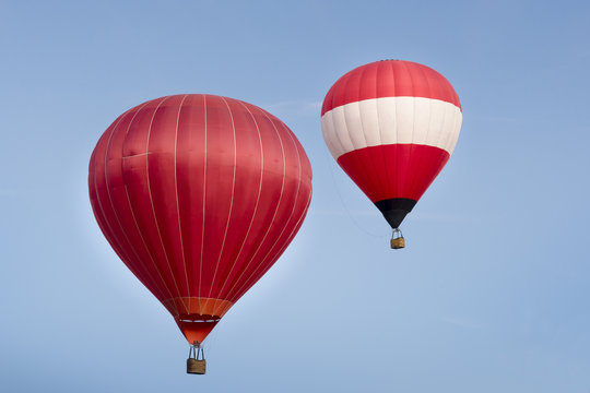 Hot air balloon ride in blue skies