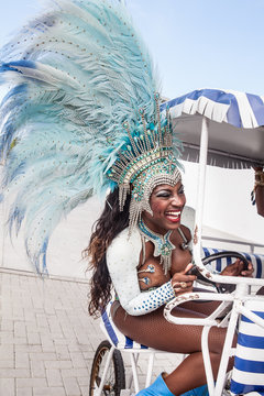 Samba dancer riding cart, Rio De Janeiro, Brazil