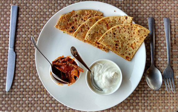 Aloo Paratha with pickle and curd