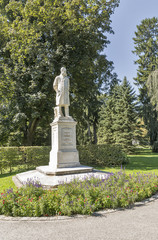 Fototapeta premium Moritz Ritter von Franck statue in Stadt park, Graz, Austria