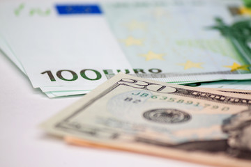 dollars and euro currencies isolated on white background.