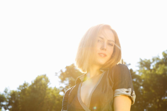 Young woman in bright sunlight