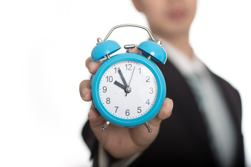 man with an alarm clock in a hand. Isolated on white background