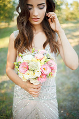 Naklejka premium Wedding bouquet with pink flowers. Wedding accessories