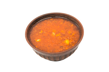 soup in a clay plate