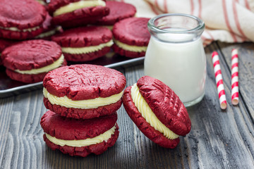 Red velvet sandwich cookies with cream cheese filling